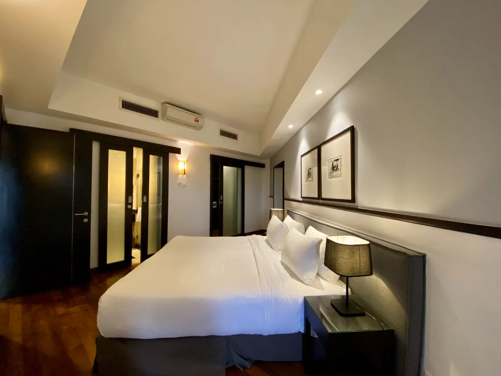 Master bedroom of a 1-bedroom suite